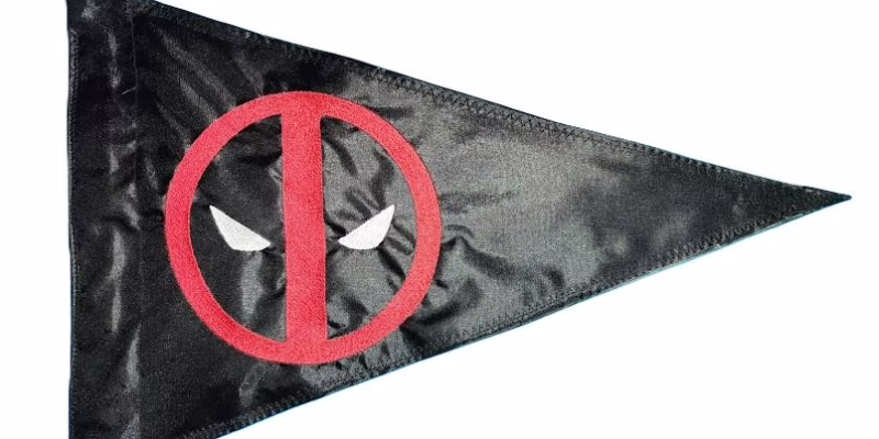 Deadpool safety flag with red and white embroidered mask emblem on black nylon pennant with whip sleeve