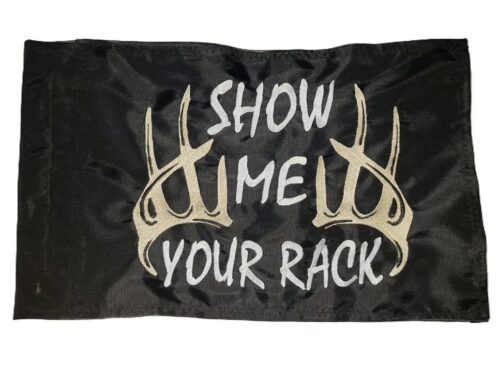 Show Me Your Rack safety flag with dense embroidered white text and tan deer antlers on black nylon rectangle with whip sleeve