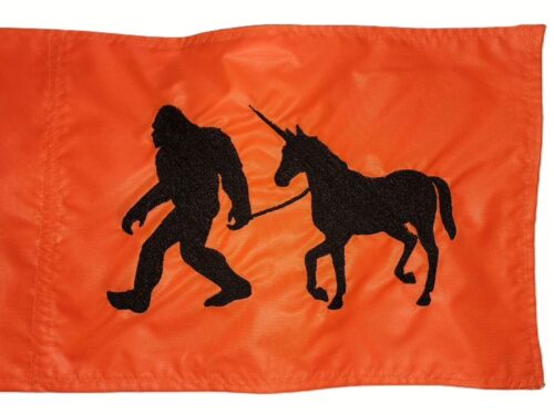 Bigfoot walking unicorn safety flag with embroidered black silhouette on bright orange nylon rectangle with whip sleeve