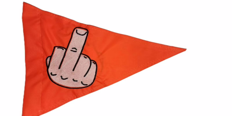 Middle finger safety flag with dense embroidered hand gesture graphic on orange nylon pennant with whip sleeve