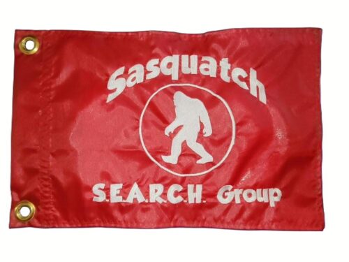 Sasquatch Search Group safety flag with embroidered white circular Bigfoot badge on red nylon rectangle with brass grommets