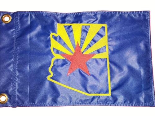 Arizona state safety flag with embroidered yellow state outline, sun rays, and red star on royal blue nylon rectangle with brass grommets