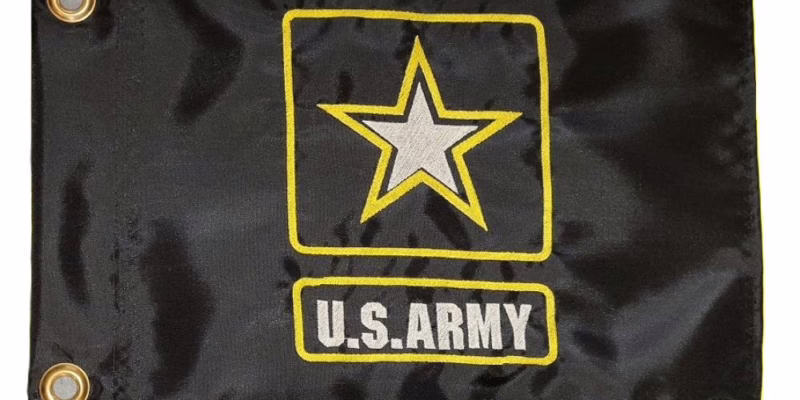 US Army safety flag with embroidered star logo and gold border on black nylon rectangle with brass grommets