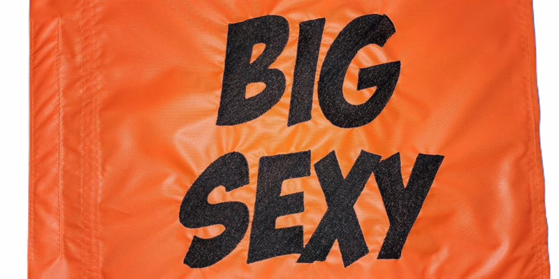 Big Sexy safety flag with double sided embroidery on durable orange nylon