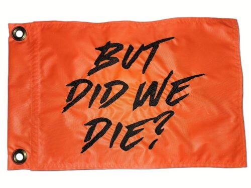 But Did We Die safety flag with black embroidered brush lettering on orange nylon rectangle