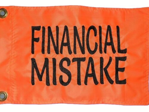 Financial Mistake safety flag with embroidered black stacked block lettering on bright orange nylon rectangle with brass grommets
