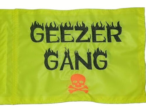 Geezer Gang safety flag with embroidered black flaming lettering and orange skull on neon lime squeeze nylon rectangle with whip sleeve