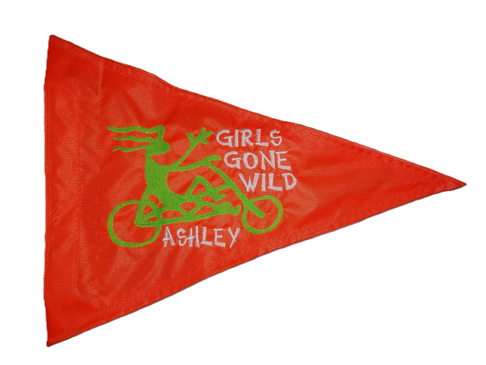 Girls Gone Wild Ashley safety flag with embroidered lime green waving recumbent rider and white lettering on bright orange nylon pennant with whip sleeve