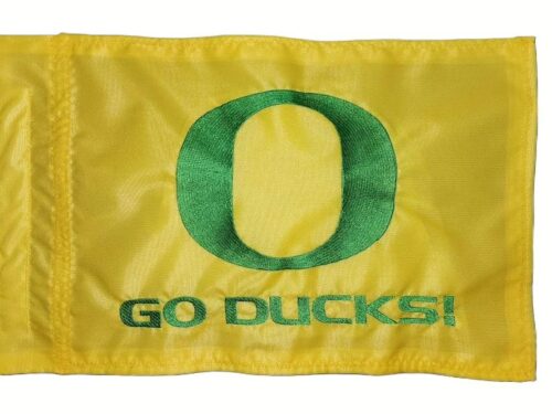 Close up of high density embroidered Oregon O and Go Ducks slogan on Oregon Ducks safety flag
