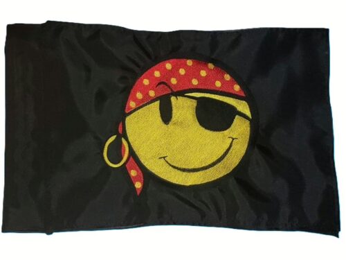 Pirate smiley safety flag with dense embroidered yellow smiley face wearing a red polka dot bandana, pirate eyepatch, and gold earring on black nylon rectangle with whip sleeve