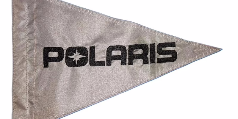 Polaris safety flag with embroidered black logo and North Star on silver nylon pennant with whip sleeve