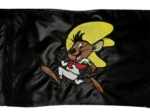 Speedy Gonzales safety flag with embroidered sprinting cartoon mouse in yellow sombrero on black nylon rectangle with whip sleeve