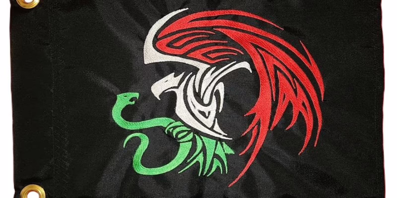 Mexican eagle safety flag with dense embroidered red, white, and green eagle and snake graphic on black nylon rectangle with solid brass grommets