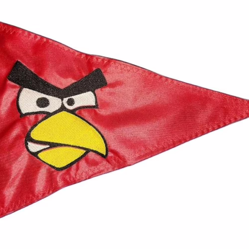 Angry Bird Red face safety flag with dense embroidered smirk expression and unibrow on nylon pennant with brass grommets