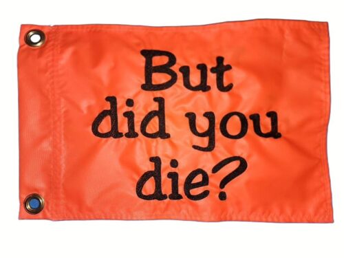 But did you die safety flag with dense embroidered black "But did you die?" text graphic on high-visibility orange nylon rectangle with solid brass grommets