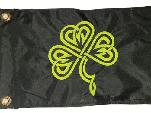 Celtic shamrock safety flag with dense embroidered lime squeeze green Celtic knot clover on black nylon rectangle with solid brass grommets