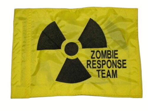 Yellow rectangle safety whip flag featuring a dense embroidered black radioactive radiation trefoil symbol and ZOMBIE RESPONSE TEAM text with a reinforced whip pole sleeve
