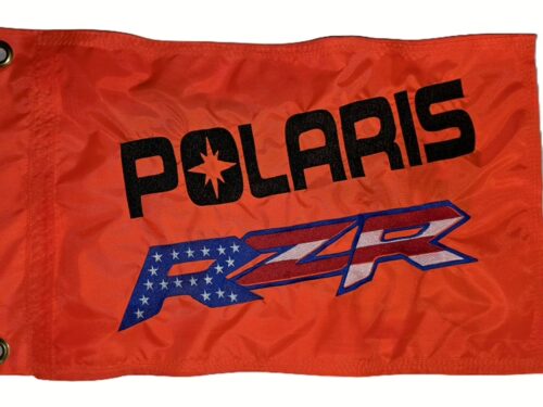 Polaris RZR American Flag safety flag with black embroidered Polaris text and patriotic Stars and Stripes RZR logo on orange nylon rectangle