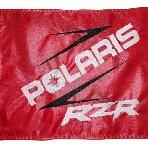 Polaris RZR safety flag with embroidered white lettering and black Z slash on red nylon rectangle with brass grommets