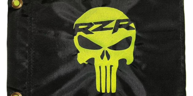 RZR Punisher safety flag with dense embroidered lime squeeze punisher skull graphic on black nylon rectangle with solid brass grommets