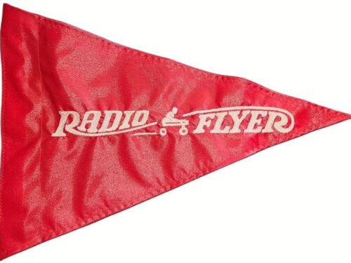Radio Flyer safety flag with dense embroidered white vintage wagon logo on red nylon pennant with whip sleeve