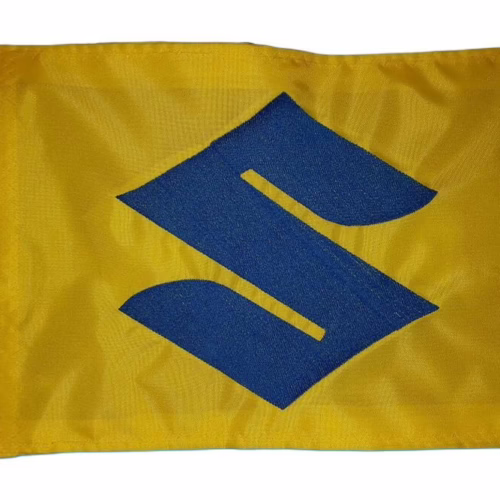 Suzuki S logo safety flag with bright blue embroidered emblem on yellow nylon rectangle with whip sleeve