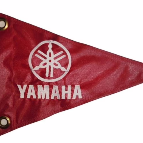 Yamaha safety flag with double sided silver embroidered tuning fork logo on red nylon pennant