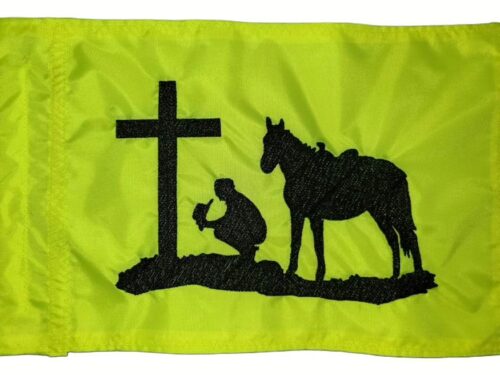 Praying cowboy at cross safety flag with dense embroidered black silhouette on lime squeeze nylon rectangle with whip sleeve