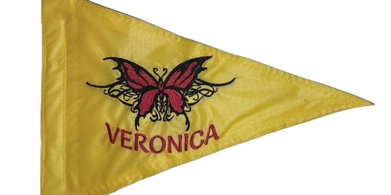 Veronica personalized butterfly safety flag with dense embroidered red and black butterfly and custom text on yellow nylon pennant with whip sleeve