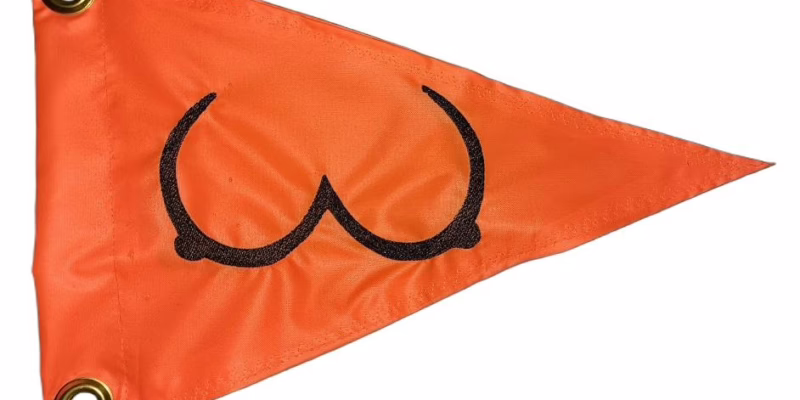 Boobies Outline safety flag with black embroidered graphic on high visibility orange nylon pennant
