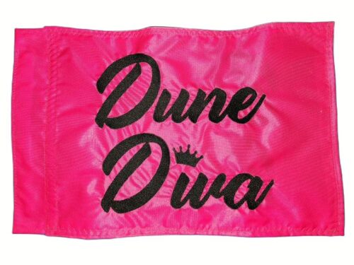 Dune diva safety flag made by Devil Woman Flags with dense embroidered black "Dune Diva" text and crown graphic on pink nylon rectangle with whip sleeve