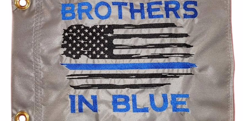 Thin Blue Line Distressed American Flag safety flag with royal blue lettering and distressed Thin Blue Line flag embroidered on silver nylon rectangle