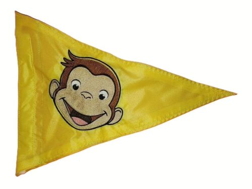 Curious George monkey safety flag with dense embroidered smiling cartoon monkey face on nylon pennant with whip sleeve