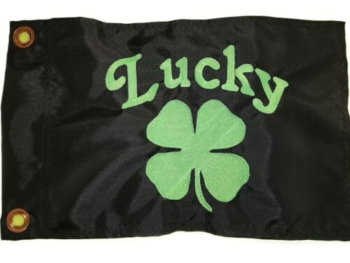 Lucky safety flag with dense embroidered fluorescent green four-leaf clover and "Lucky" text on black nylon rectangle with solid brass grommets