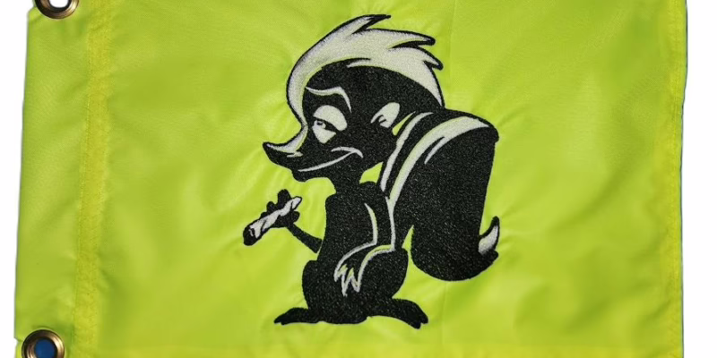 Pepe Le Pew skunk safety flag with dense embroidered black and white skunk holding cigarette on Lime Squeeze nylon rectangle with solid brass grommets