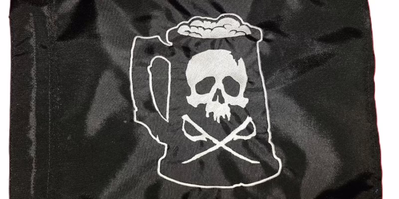 Beer mug pirate safety flag with dense embroidered white beer stein skull and crossbones graphic on black nylon rectangle with whip sleeve