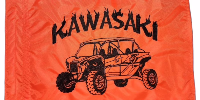 Kawasaki Teryx KRX safety flag with embroidered black flame lettering and KRX UTV on bright orange nylon rectangle with whip sleeve