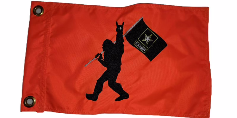 Bigfoot US Army safety flag with embroidered black Sasquatch carrying Army flag on bright orange nylon rectangle with brass grommets