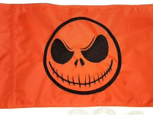 Jack Skellington safety flag with black embroidered skull grin on orange nylon rectangle with whip sleeve