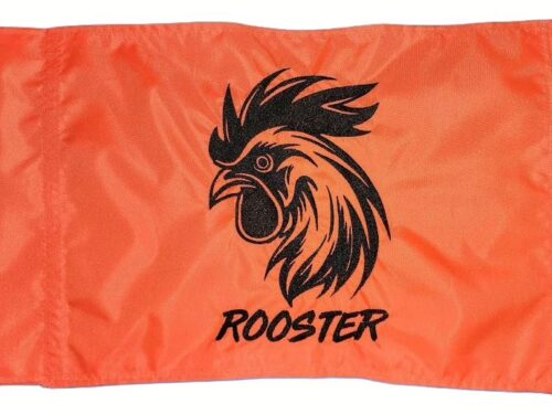 Rooster safety flag with dense embroidered black rooster head and text on orange nylon rectangle with whip sleeve