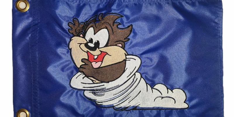 Baby Tasmanian Devil tornado safety flag with dense embroidered cartoon whirlwind on nylon rectangle with brass grommets