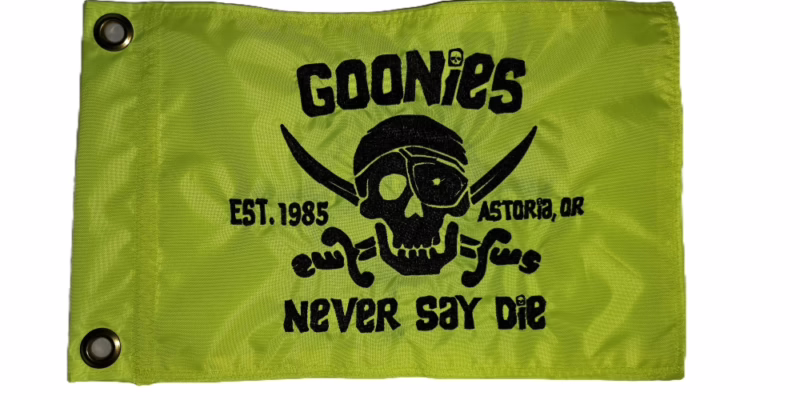 Close up of high density embroidered One Eyed Willie pirate skull on Goonies safety flag