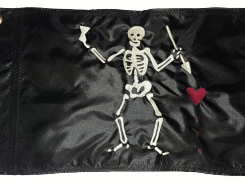 Close up of high density embroidered skeleton and heart on Blackbeard Pirate safety flag