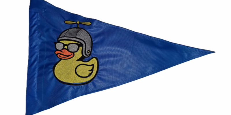 Close up of high density embroidered duck with propeller helmet on Whirly Biker Duck safety flag